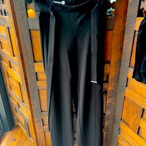 Long black pant with a flare at the bottom